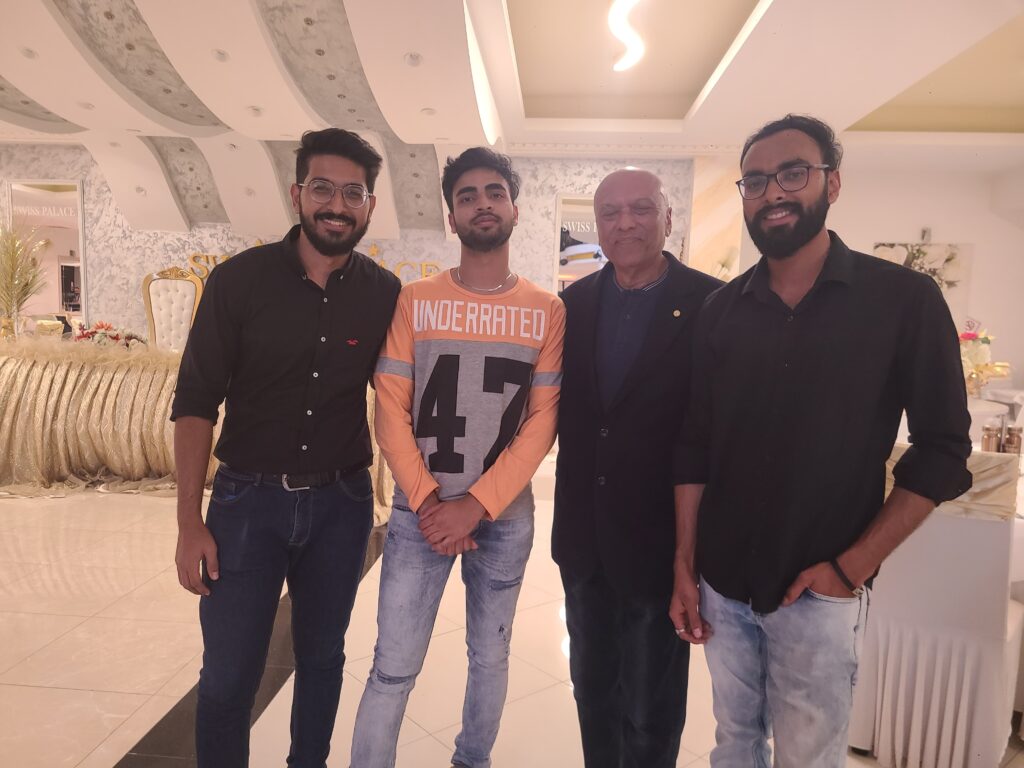 withSirKamgroupPhoto